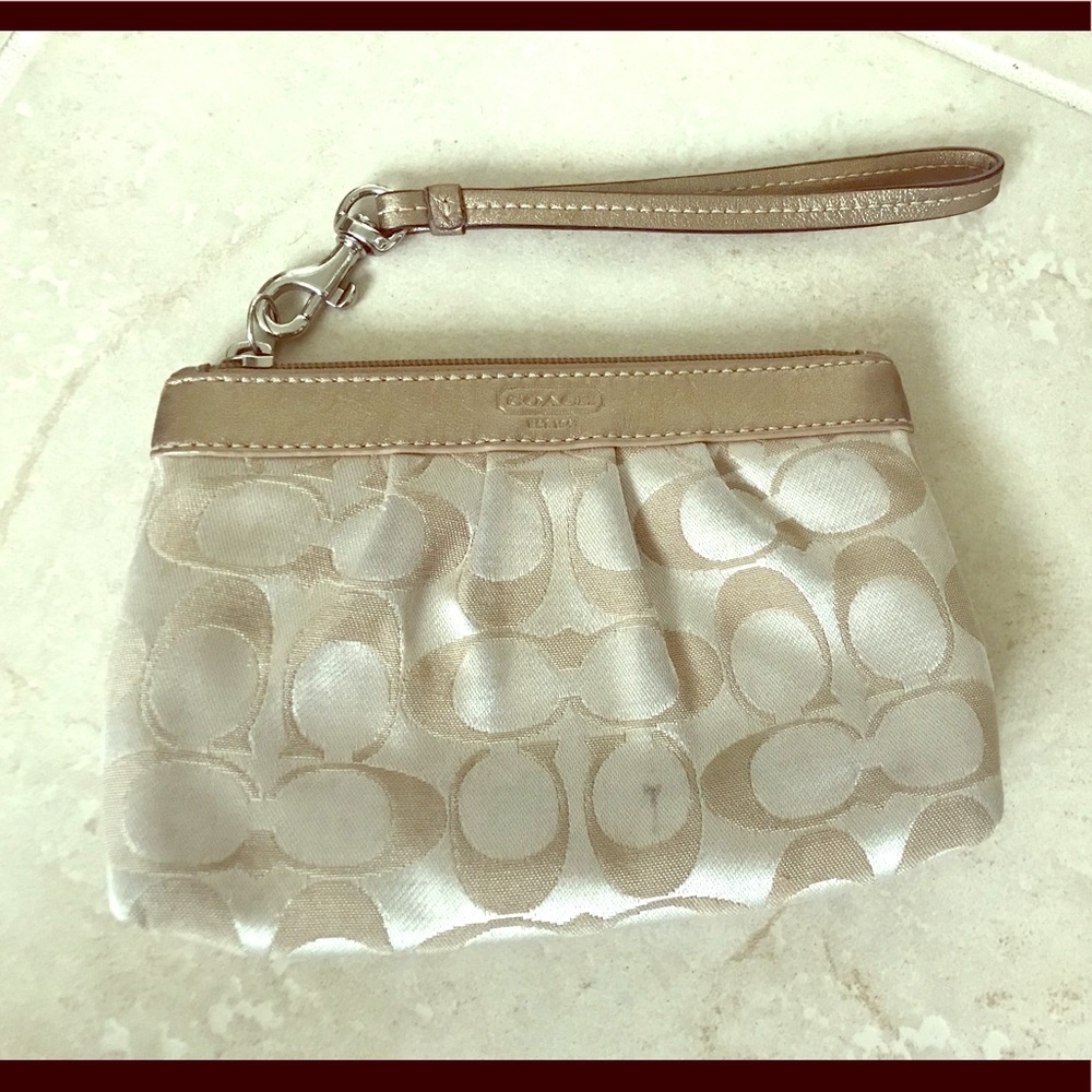 Coach gold wristlet
